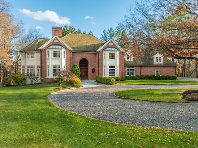 view of front of house with a front lawn