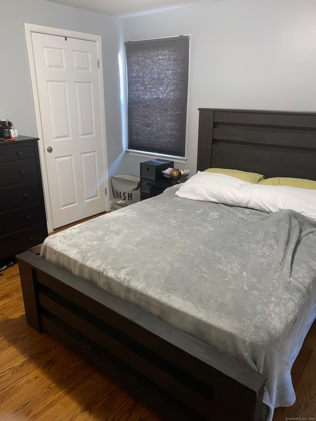 bedroom featuring wood-type flooring