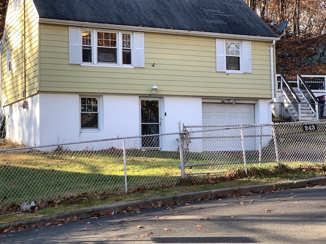 view of front of home with a garage