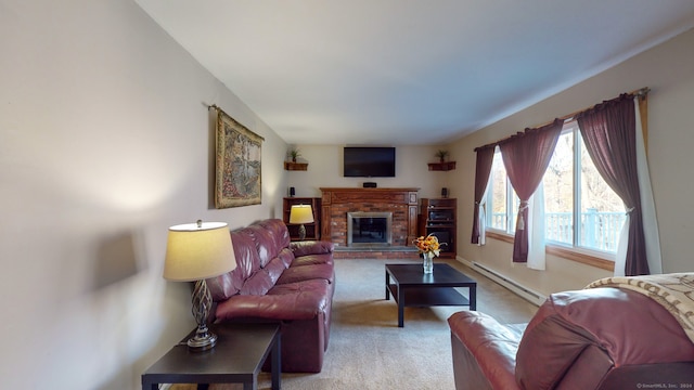 carpeted living room with a baseboard heating unit