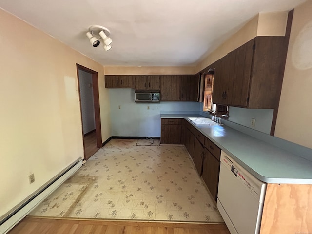 kitchen featuring dark brown cabinetry, sink, a baseboard radiator, dishwasher, and light hardwood / wood-style floors