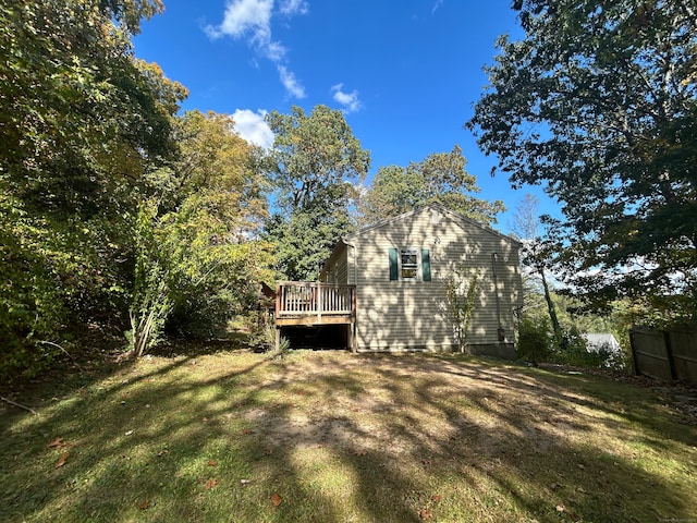 view of yard with a wooden deck