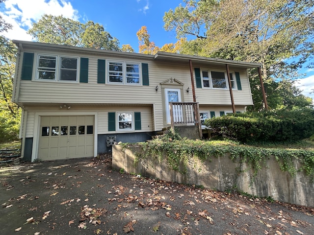 split foyer home featuring a garage