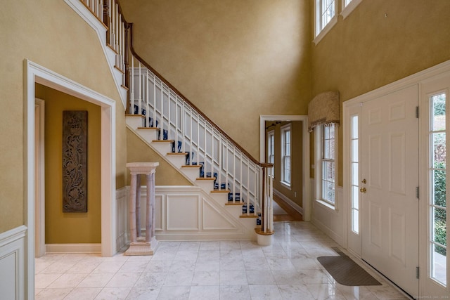 entryway featuring a high ceiling