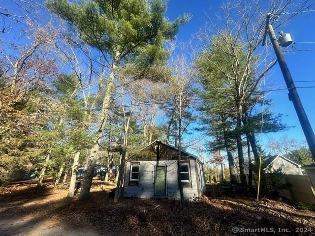 18 Birch Rd, East Haddam, CT 06469 - view of home's exterior featuring an outbuilding and concrete block siding
