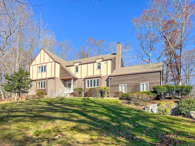 view of front of home with a front yard