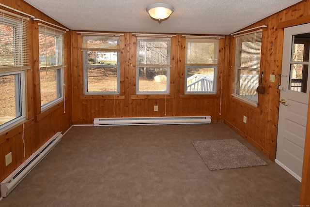 unfurnished sunroom featuring a baseboard radiator