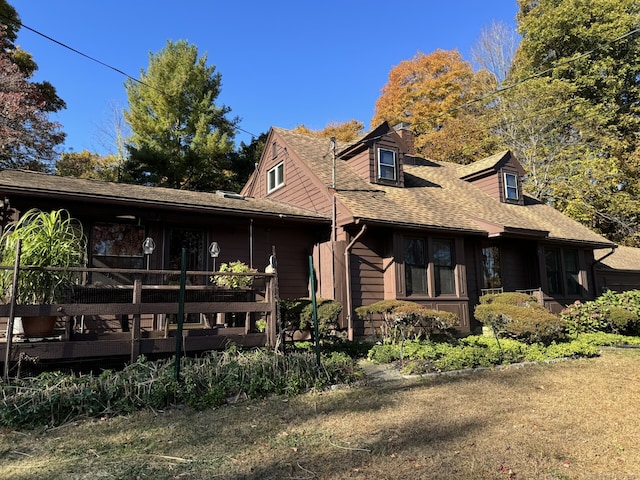 view of front of house featuring a wooden deck