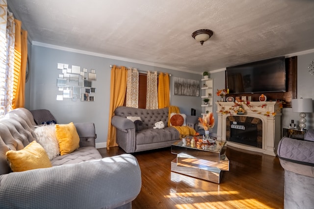 living room with ornamental molding and hardwood / wood-style floors