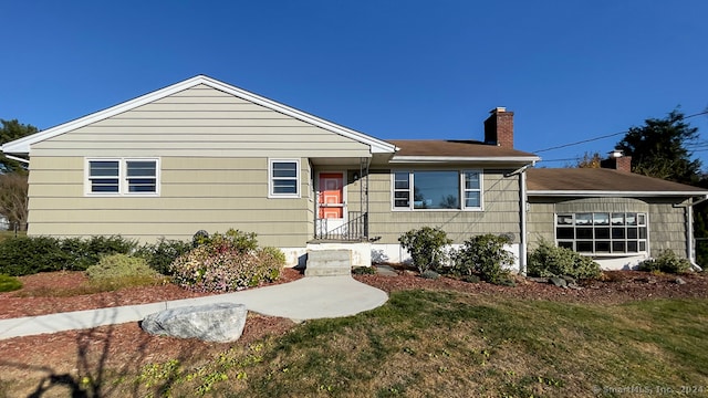 view of front of house with a front yard