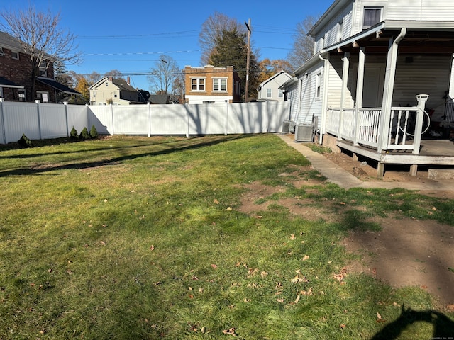 view of yard with central AC