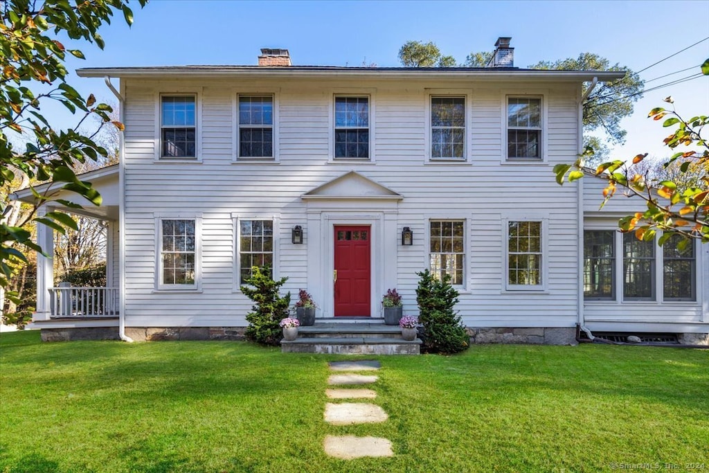 colonial house with a front lawn