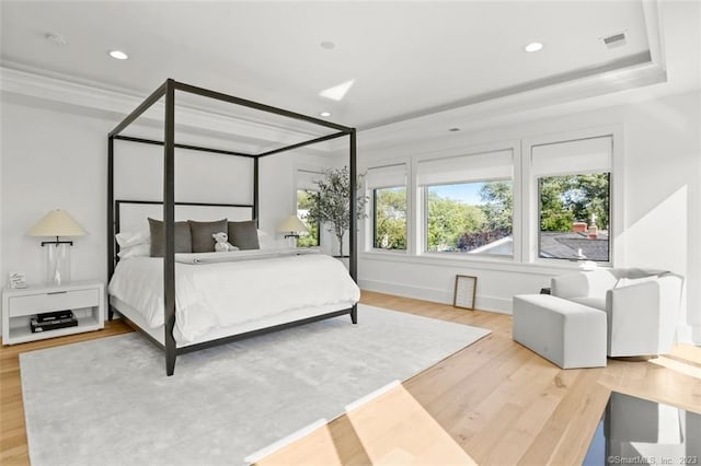 bedroom with hardwood / wood-style flooring