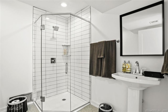 bathroom with an enclosed shower