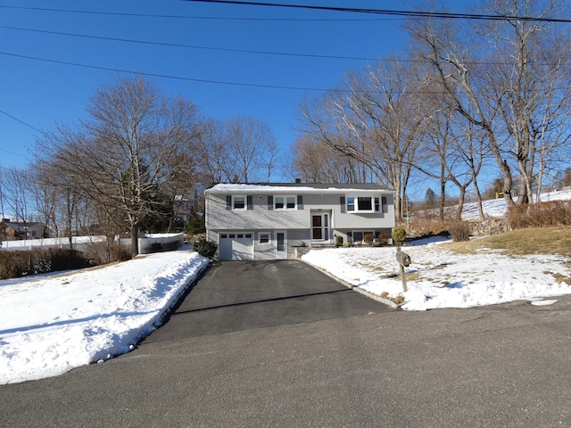 bi-level home with a garage