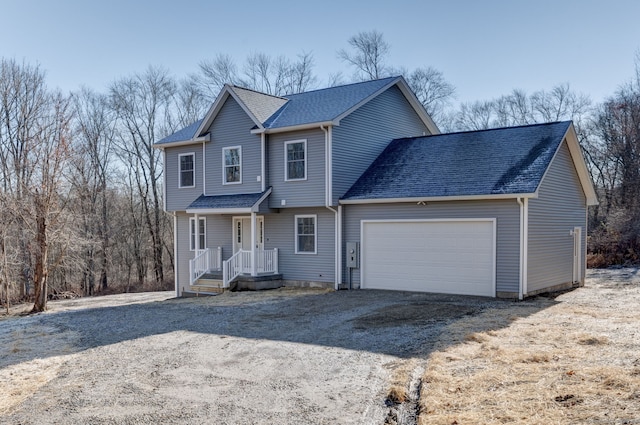 front of property with a garage