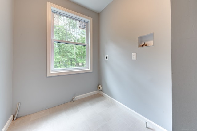 laundry room with hookup for a washing machine and hookup for an electric dryer