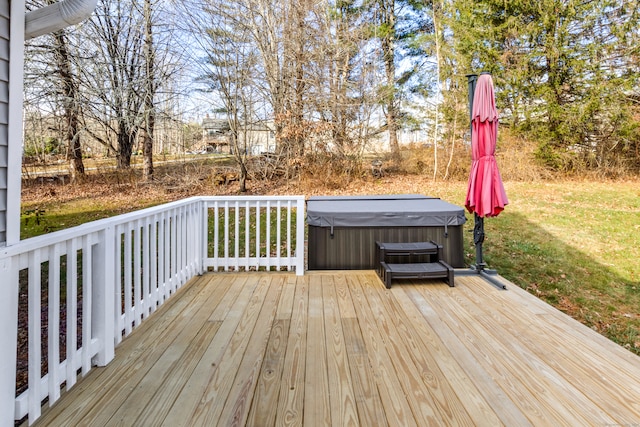 wooden terrace with a hot tub