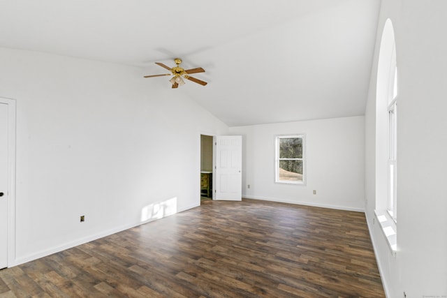 unfurnished room featuring dark hardwood / wood-style floors, ceiling fan, and high vaulted ceiling