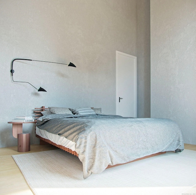 bedroom featuring hardwood / wood-style floors