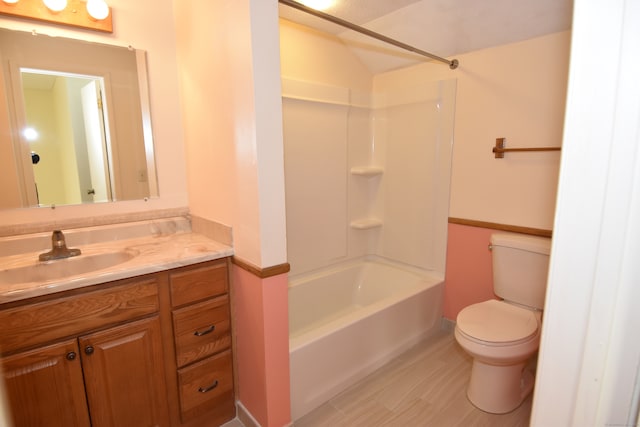 full bathroom featuring vanity, shower / bathtub combination, and toilet