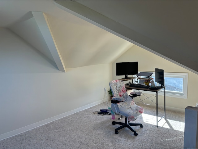 office space featuring carpet floors and lofted ceiling