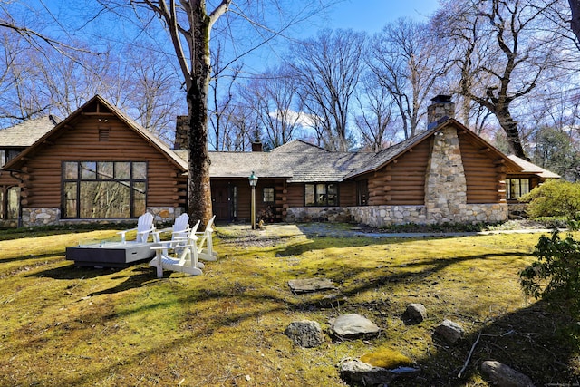 87 Red Coat Rd, Westport, CT 06880 - view of front of home featuring a chimney, log siding, and stone siding