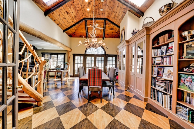 87 Red Coat Rd, Westport, CT 06880 - dining space with a chandelier, high vaulted ceiling, wooden ceiling, french doors, and a skylight