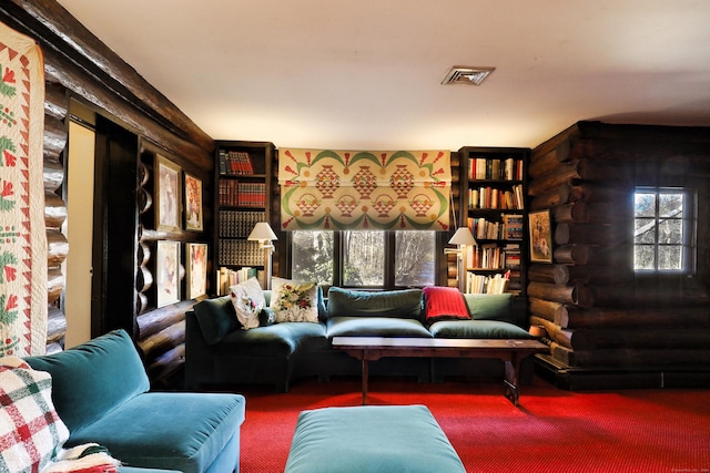 87 Red Coat Rd, Westport, CT 06880 - carpeted living area with plenty of natural light and rustic walls
