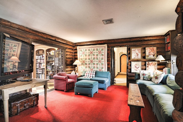 87 Red Coat Rd, Westport, CT 06880 - carpeted living area featuring log walls