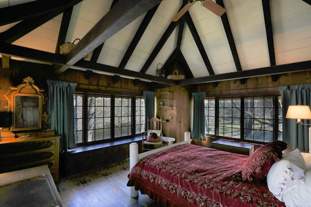 87 Red Coat Rd, Westport, CT 06880 - bedroom featuring wood finished floors, beamed ceiling, multiple windows, high vaulted ceiling, and wood walls