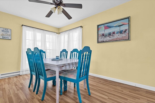 140 Salt Island Rd, Westbrook, CT 06498 - dining area with baseboards, wood finished floors, and healthy amount of natural light