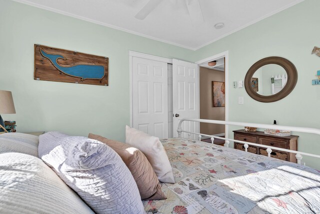 140 Salt Island Rd, Westbrook, CT 06498 - bedroom with crown molding, a closet, and a ceiling fan
