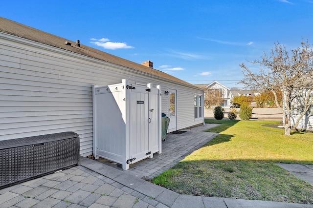 exterior space featuring a yard and a patio