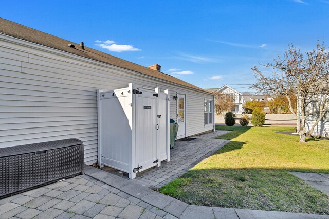 140 Salt Island Rd, Westbrook, CT 06498 - view of side of property with a lawn, a chimney, and a patio