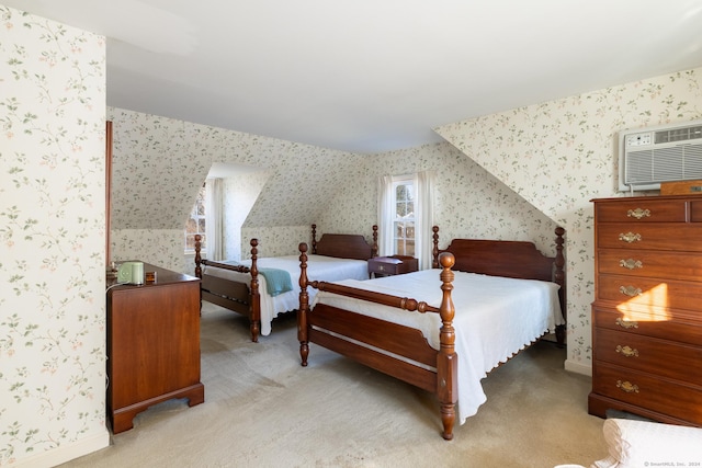 bedroom featuring a wall mounted air conditioner and light colored carpet