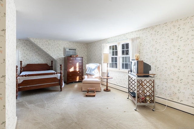 carpeted bedroom with an AC wall unit and a baseboard heating unit