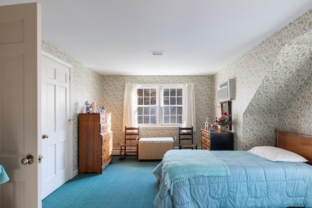 carpeted bedroom with baseboard heating and a wall mounted AC