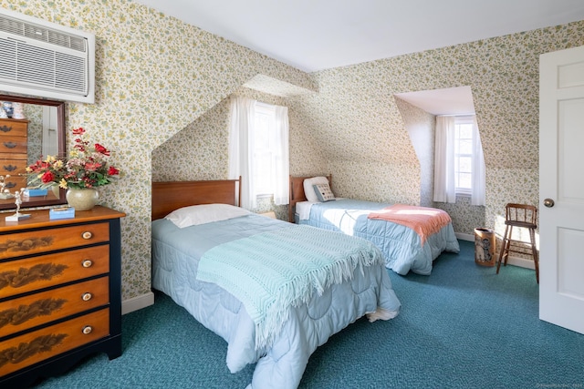 carpeted bedroom featuring an AC wall unit