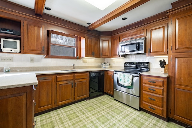 kitchen with decorative backsplash, sink, beamed ceiling, and stainless steel appliances