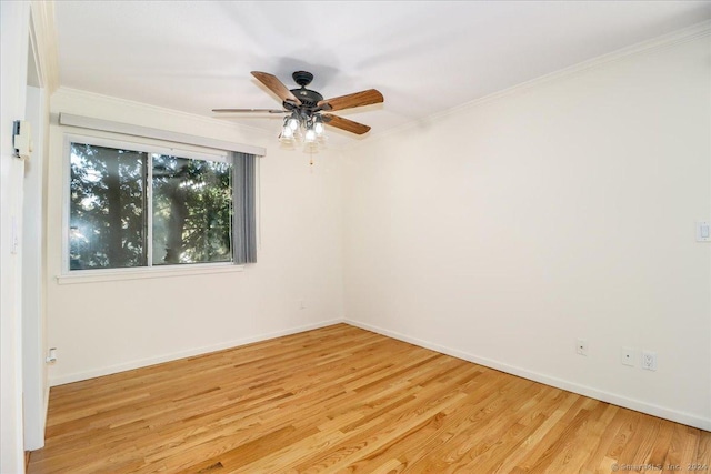 unfurnished room with ornamental molding, ceiling fan, and light hardwood / wood-style flooring