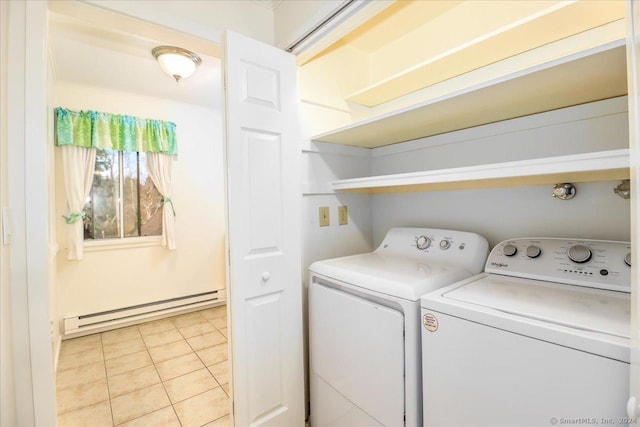 laundry area featuring separate washer and dryer, light tile patterned floors, and a baseboard heating unit