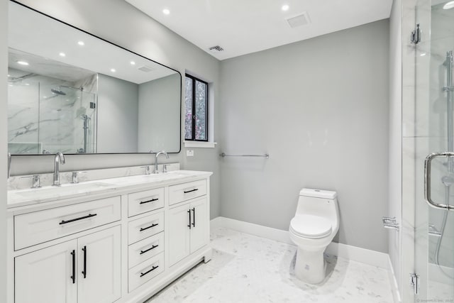 bathroom with vanity, toilet, and walk in shower