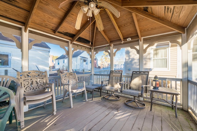 wooden deck featuring a gazebo and ceiling fan