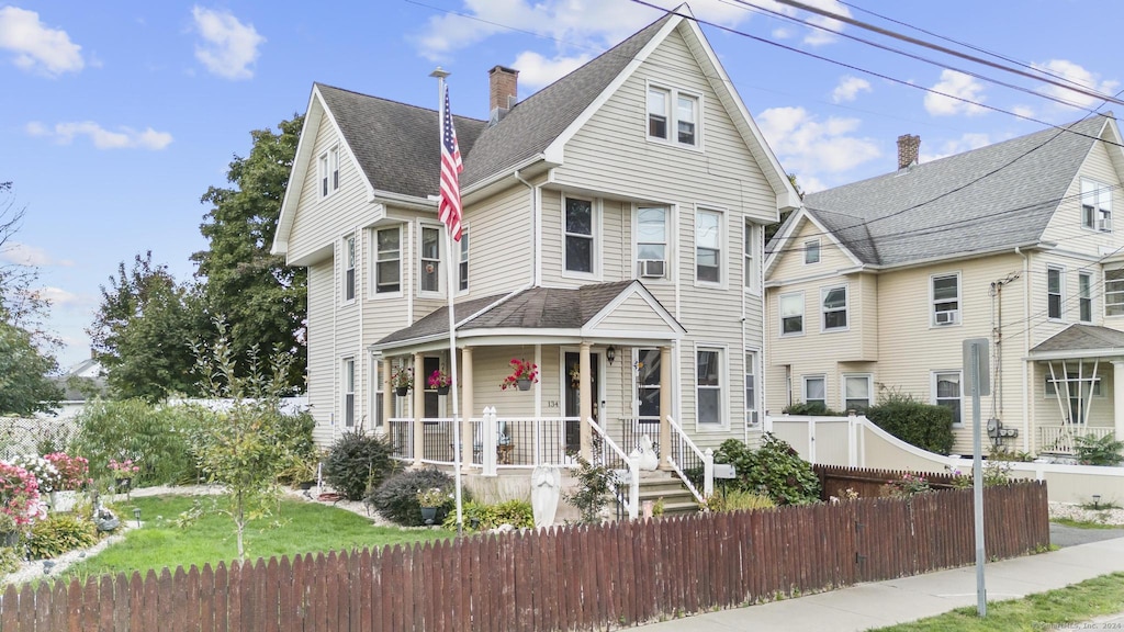 view of property with covered porch