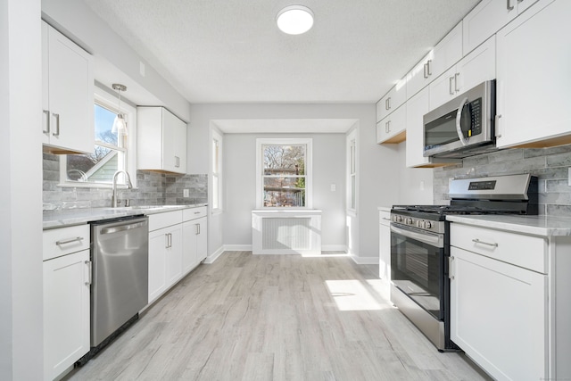 kitchen with white cabinets and stainless steel appliances