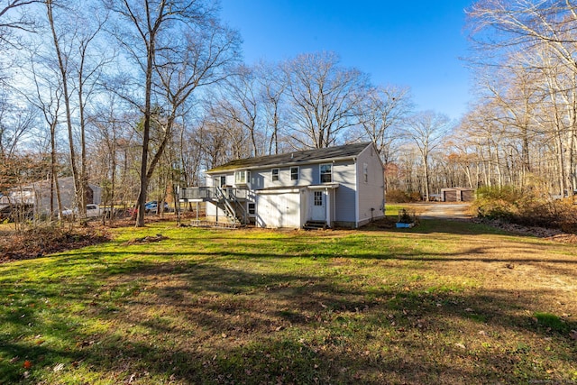 view of yard featuring a wooden deck