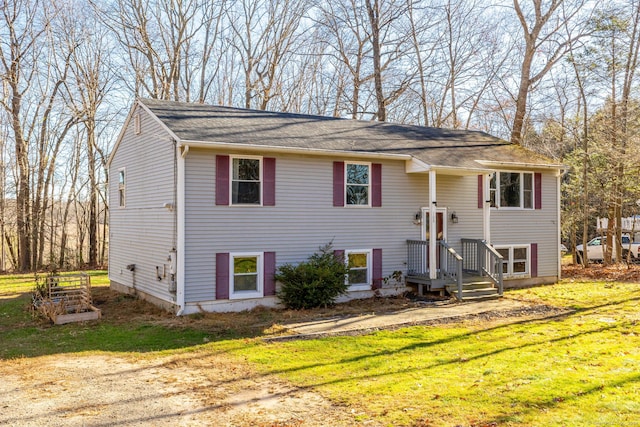 bi-level home with a front yard