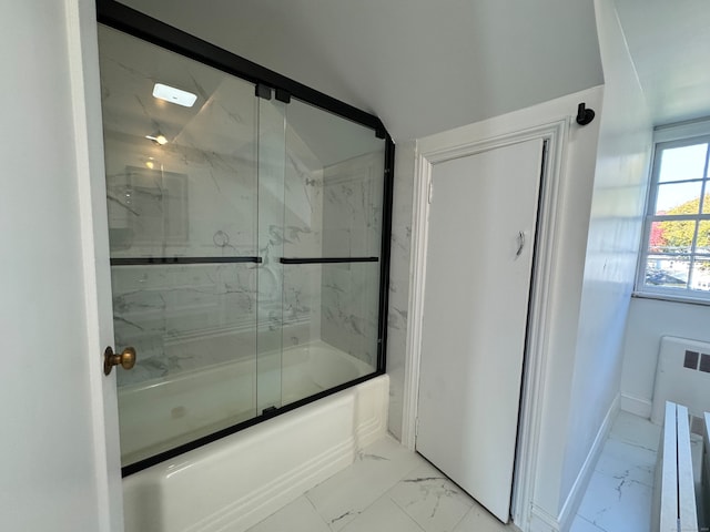 bathroom with shower / bath combination with glass door and vaulted ceiling