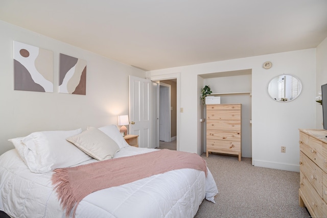 bedroom with light colored carpet